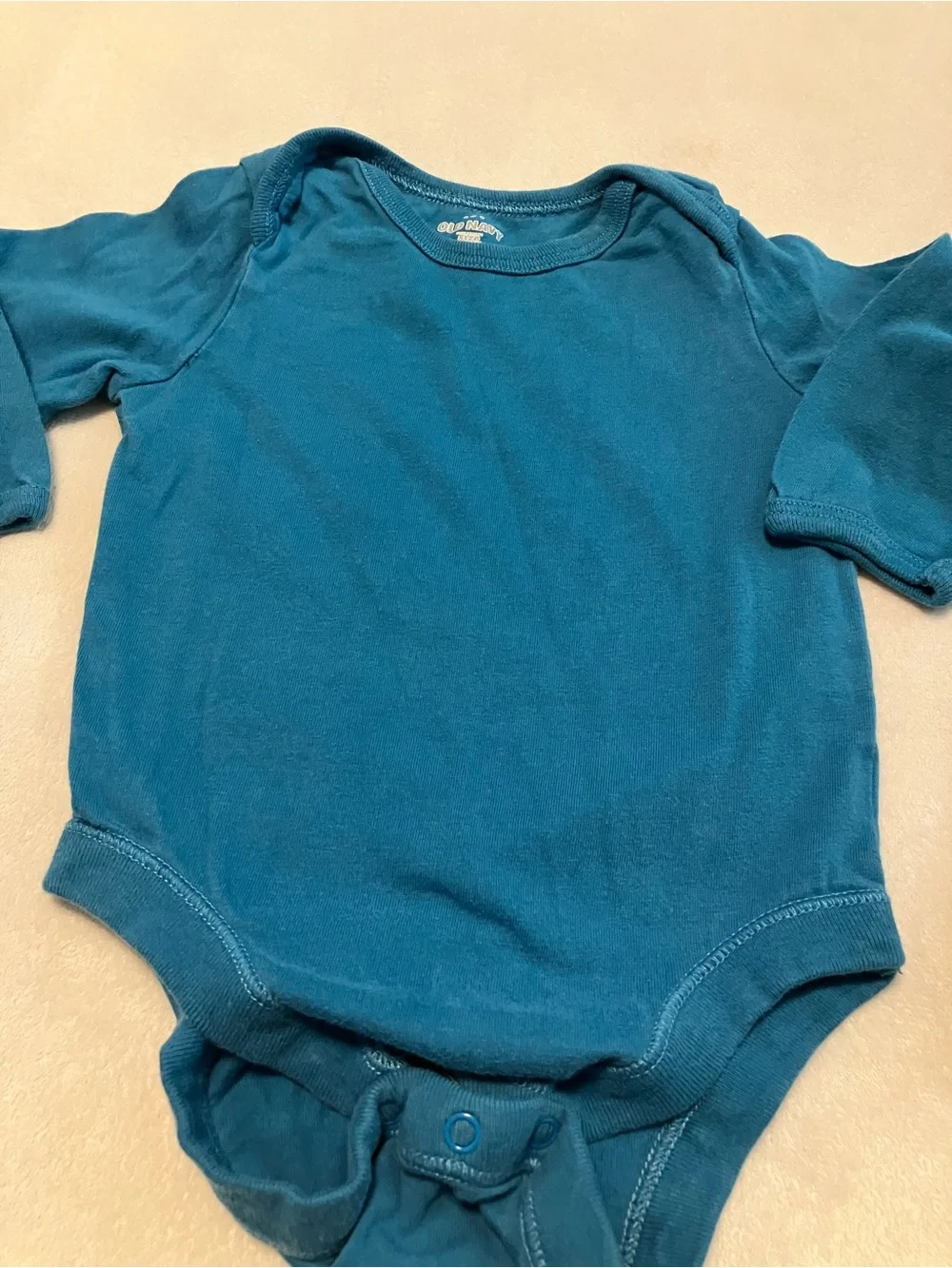 Teal Infant Long Sleeve Bodysuit and Dark Wash Jeans
